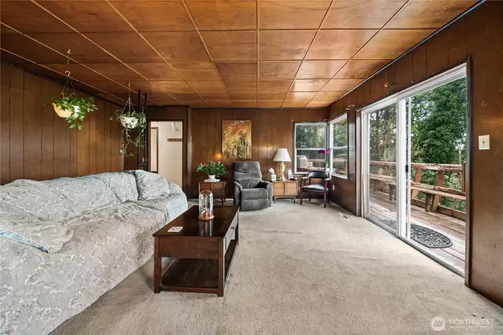 Good-sized living room offers the best VIEW of Sinclair's Inlet. Lots of large windows (updated vinyl) keep it nice and bright.