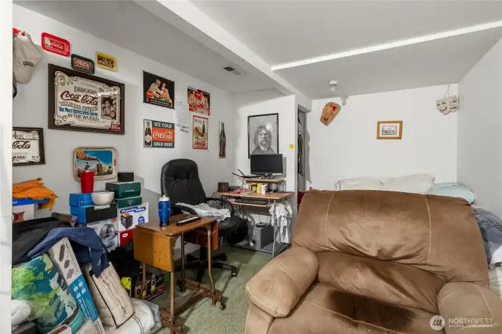Lower level Bonus room has a closet and windows that are currently covered with wallboard on the inside. This was previously 2 smaller bedrooms - and would make a great primary!