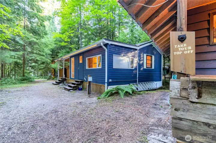 Back corner of lot showing spacious grounds and multiple structures