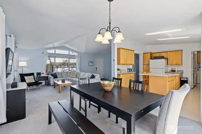 Dining open to kitchen and living room