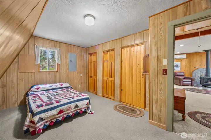 Generous bedroom with multiple storage areas—perfect for full-time living or short-term rental flexibility.