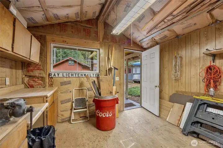 Detached shop with workspace and natural light—great for hobby use or supporting an active short-term rental lifestyle in Packwood.
