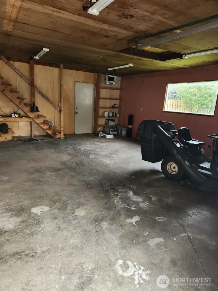 Another shop view showing stairs to pool room.