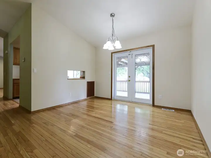 Dining room with access to back deck.   Pass through to kitchen.