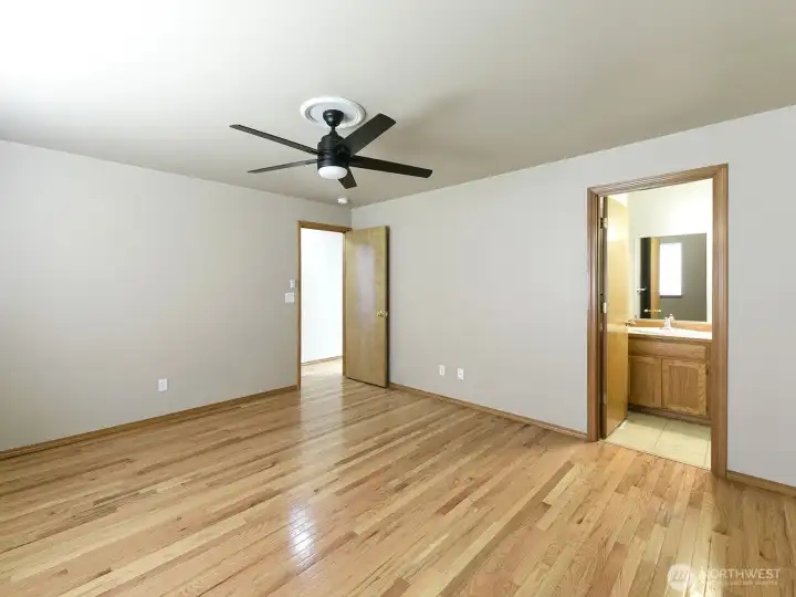 Primary Bedroom with walk in closet and full ensuite bath.