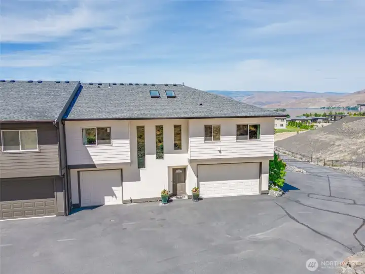 Double tandem garage 35 feet deep plus a separate single car garage w/abundant guest parking.