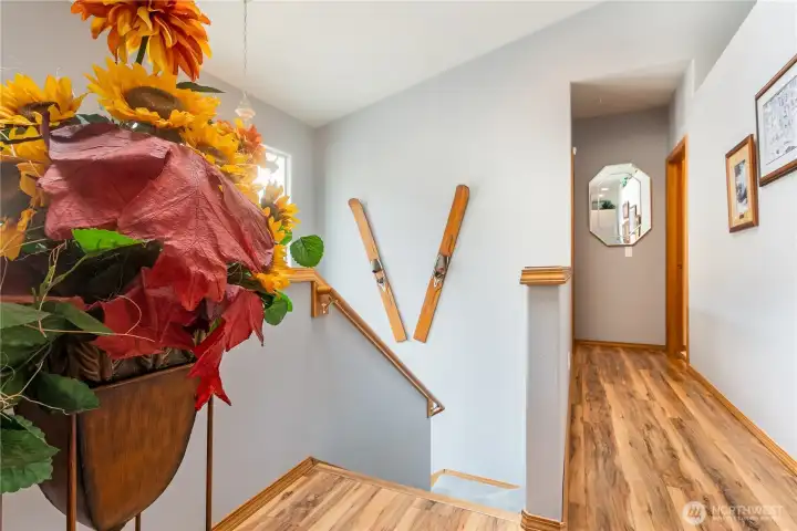 New flooring in hallway/kitchen and entry.