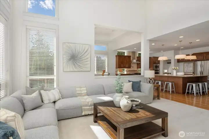Open-concept design seamlessly connects the family room to the spacious chef's kitchen and elegant Morning Room, creating an ideal setting for everyday living and effortless entertaining.