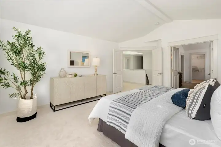 Step through elegant French doors into your expansive primary suite, where abundant natural light and a serene ambiance lead seamlessly to a luxurious spa-inspired ensuite, creating a refined retreat you'll look forward to every day.