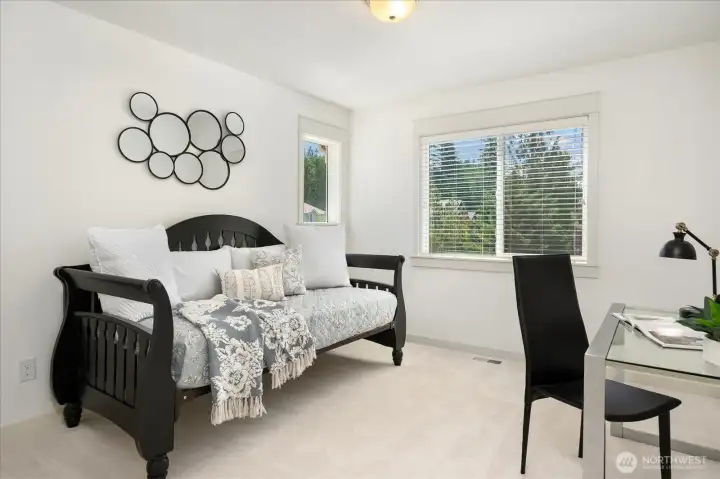 Bedroom #2 is bright and inviting, featuring fresh interior paint, plush new carpet, abundant natural light, and a spacious closet for comfortable everyday living.