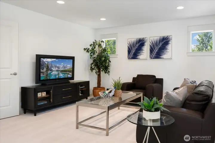 Expansive bonus room designed for the way you live—ideal as a media room, game room, home gym, or second living area, with abundant natural light and endless possibilities.