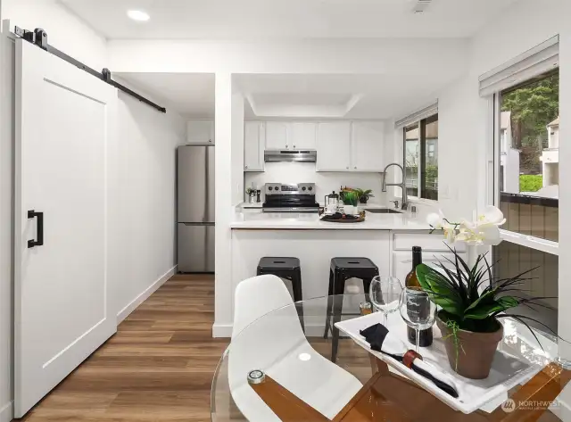 Dining room + kitchen.