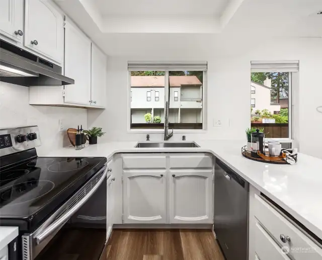 Kitchen gets wonderful light from multiple windows along the SE side of the unit.