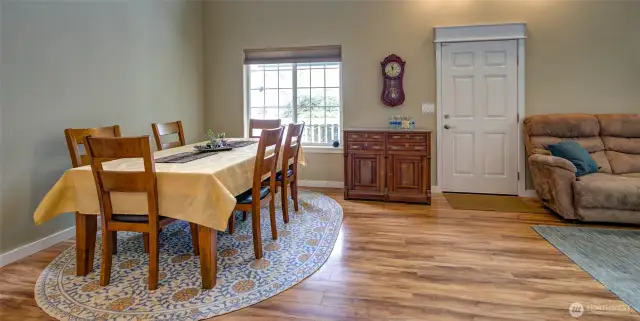 The kitchen overlooks The dinning and living room area.