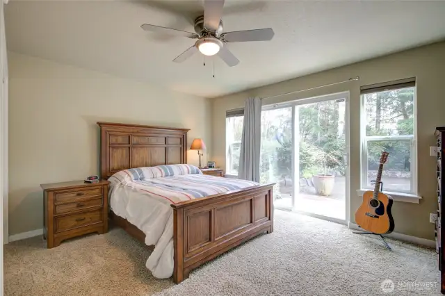 Beautiful main floor primary suite opens onto the rear deck.