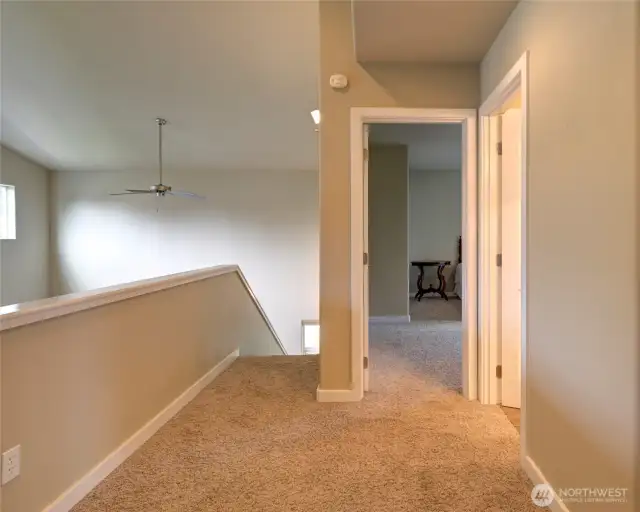 At the landing at the top of the stairs, there is another bedroom and bathroom.