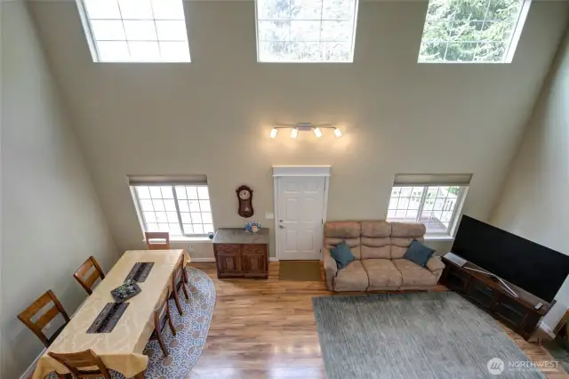 Looking down at the main living space from the upper landing.