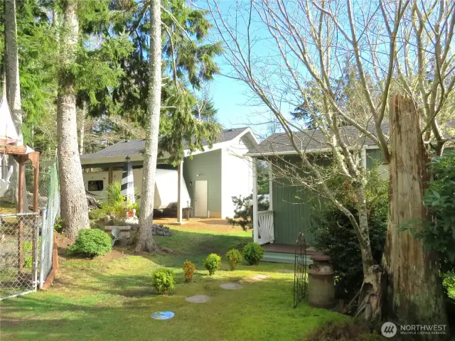 Strolling between the RV garage and the art studio, we see the first part of the private back yard.
