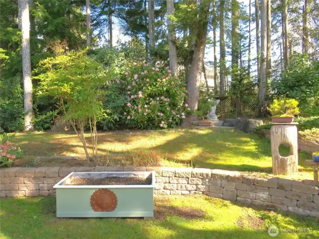 Gorgeous, mature landscaping graces the area.