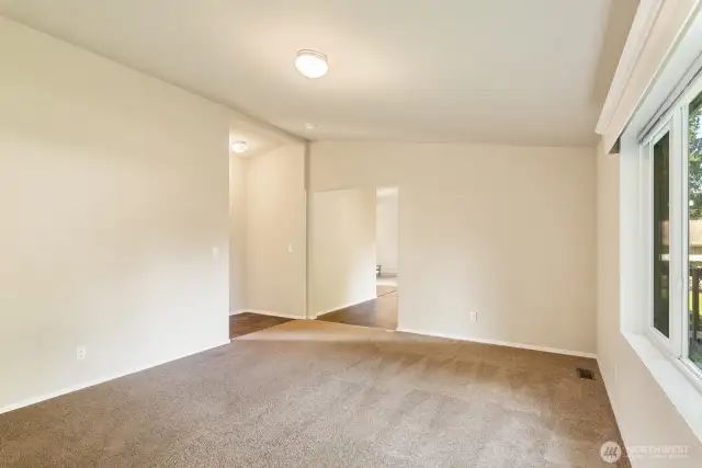 Large family room. Nice big window for natural light.