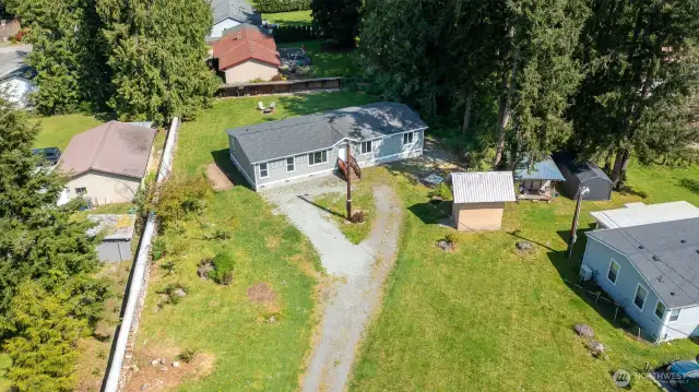 Nice storage shed with metal room and loft.