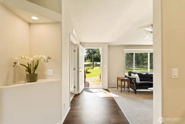 Welcome in! Great Sunny location for lots of natural light.  Blinds on all of the windows.