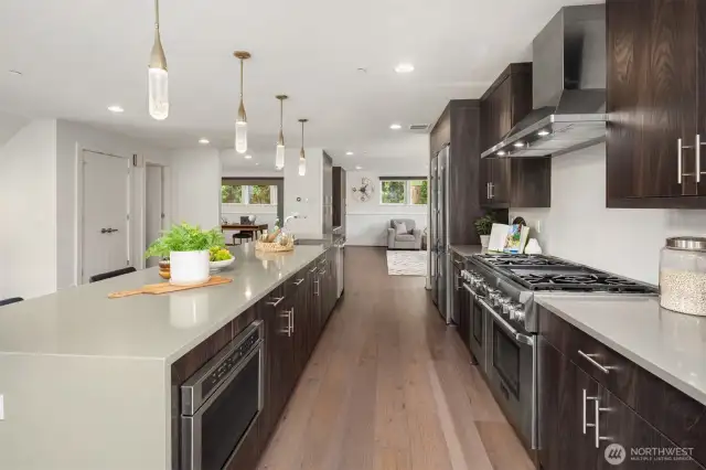 Top of the line appliances including a large Liebherr refrigerator and a double Thermador oven with 6 cooktops.