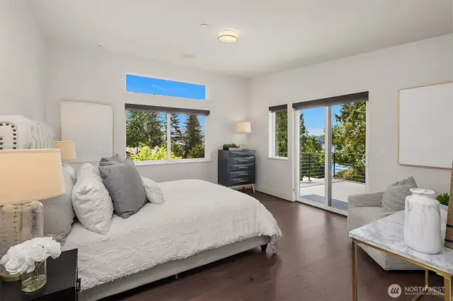 Large Primary suite with private deck and walk in closet.