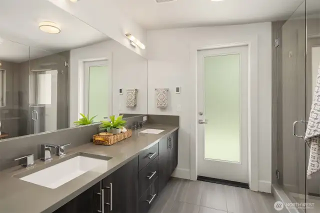 Primary bathroom also walks out to deck.