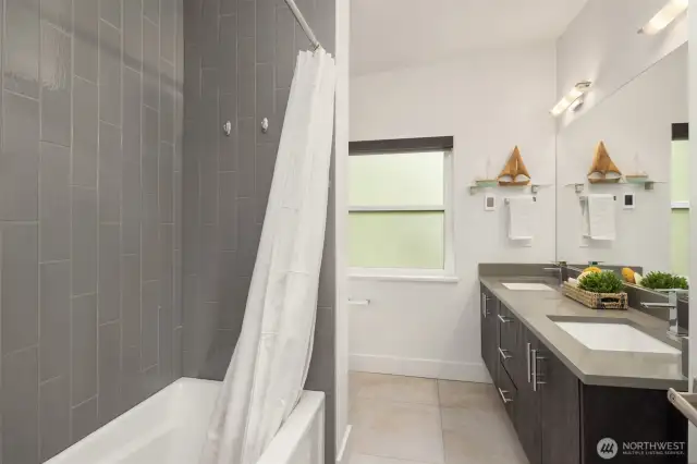 Full bathroom shared by bedrooms.