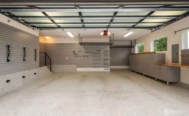 2 car garage with lots of storage and car charger (not shown).