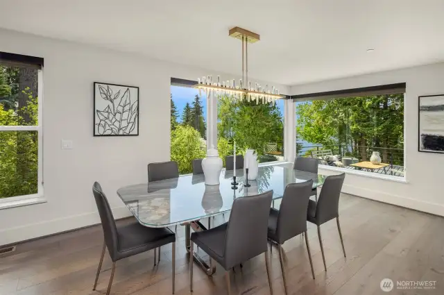 Dining area looks out at deck views for miles. New stunning light fixture.