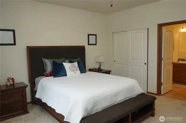 Primary bedroom showing closet and ensuite bath.
