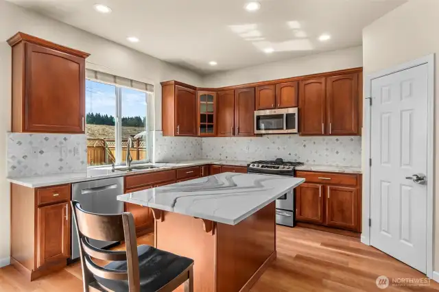 Newer quartz countertop and backsplash