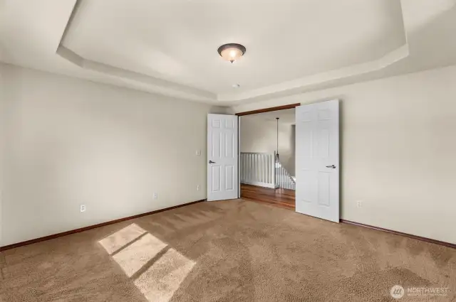 Double doors at primary bedroom