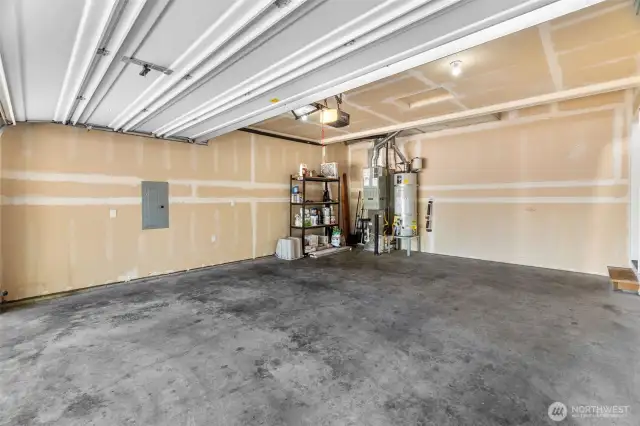 Gas furnace and water heater located in the 2 car garage.
