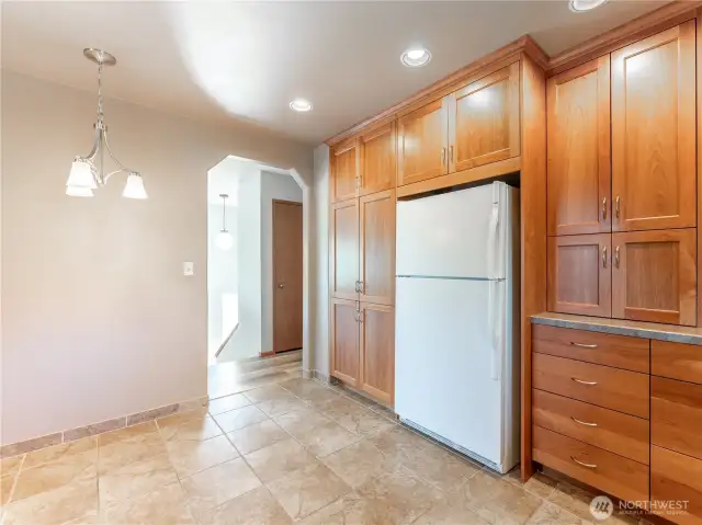 Main floor kitchen and hallway to bedrooms and bathrooms