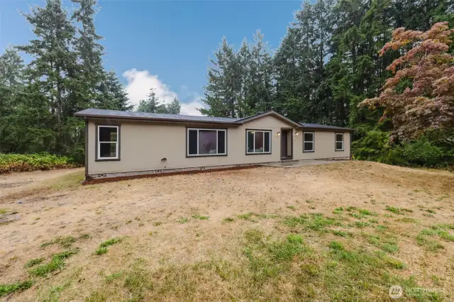 Front exterior of home showcasing single-level layout.
