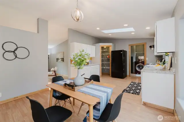 Dining space connected to kitchen and living room.