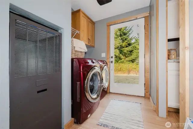 Laundry/mudroom with exterior access for convenience.