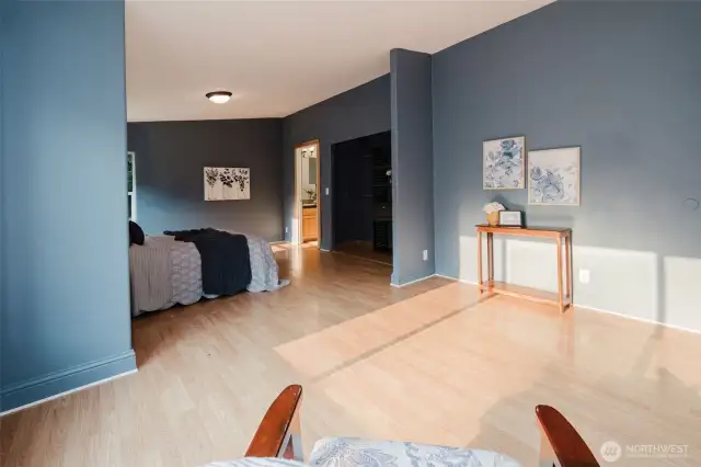 Spacious primary suite with seating area.