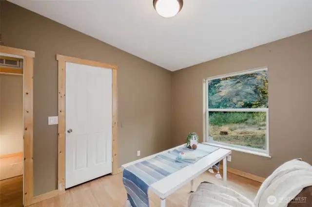 Bedroom with exterior access and private setting.