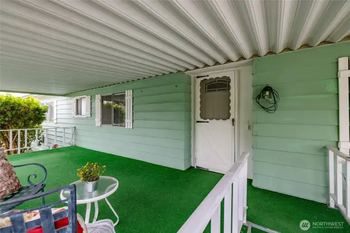 Wave to your neighbors from your large covered front porch!