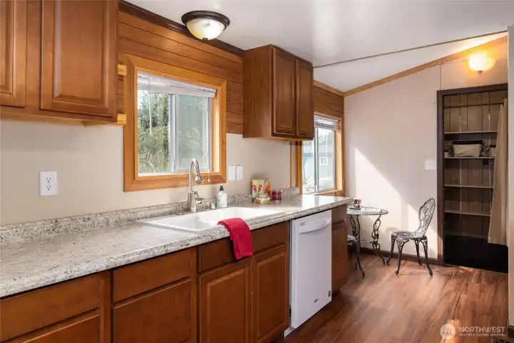 In the background, the pantry closet off the kitchen