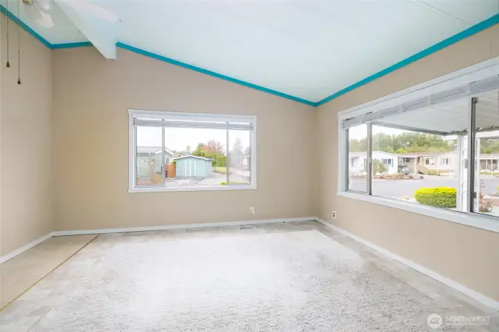 With vaulted ceilings and tons of natural light, this room lends itself to many uses - family room? Artist's studio? Reading room? Craft studio? Yoga studio?  You decide!