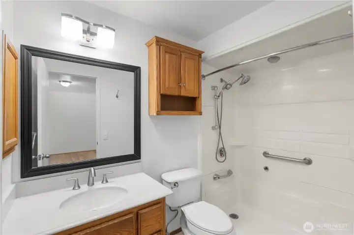 Updated Primary Bathroom with large easy access shower.