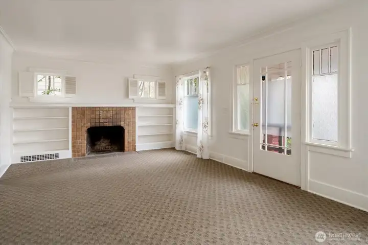 Welcome to large living room that is connected to the dining room.