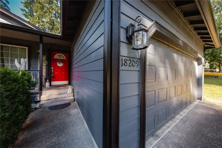 fresh exterior paint, including custom matching black gutters