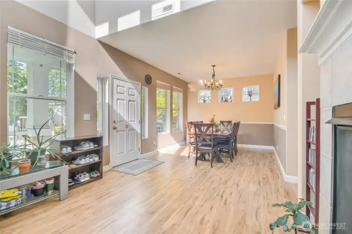 High ceiling in Living room and wall of windows bringing in natural lights