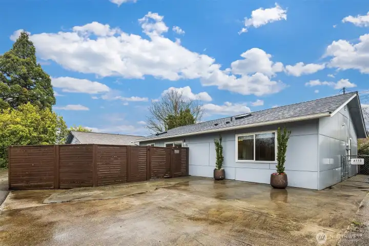 Two off-street parking spaces off the back alley provide easy access to the home without stairs, adding convenience that is as practical as it is rare.